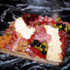Photo de plateau de charcuterie fine raclette Rocheman - Charcuterie fine d'exception halal