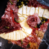 Photo de plateau de charcuterie fine raclette Rocheman - Charcuterie fine d'exception halal