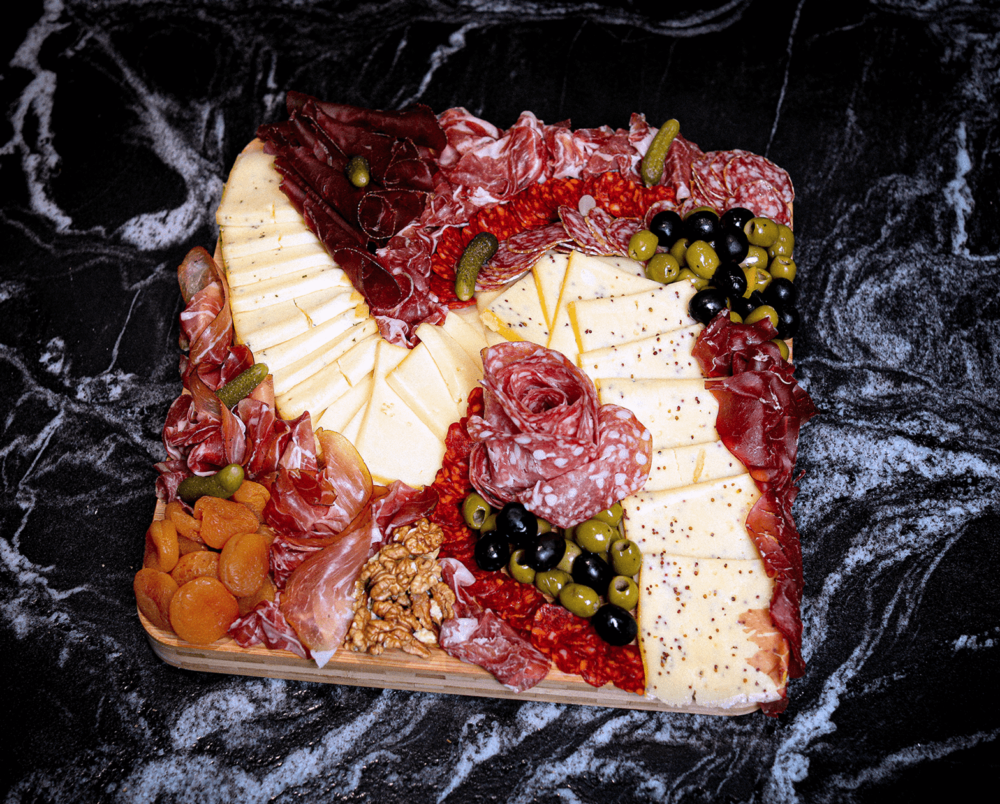 Photo de plateau de charcuterie fine raclette Rocheman - Charcuterie fine d'exception halal